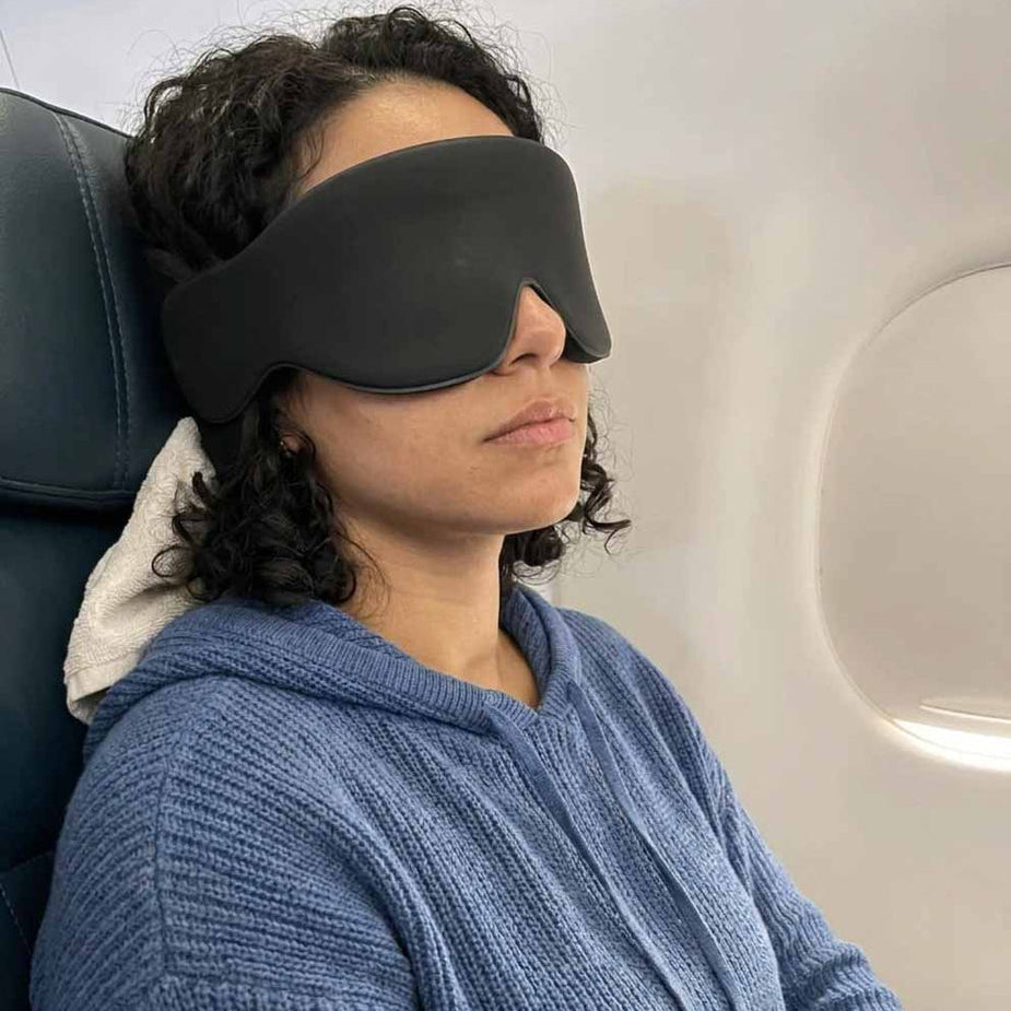 Traveler asleep wearing the mask